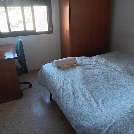 Проживание в семье 2 Camas En Piso Compartido *